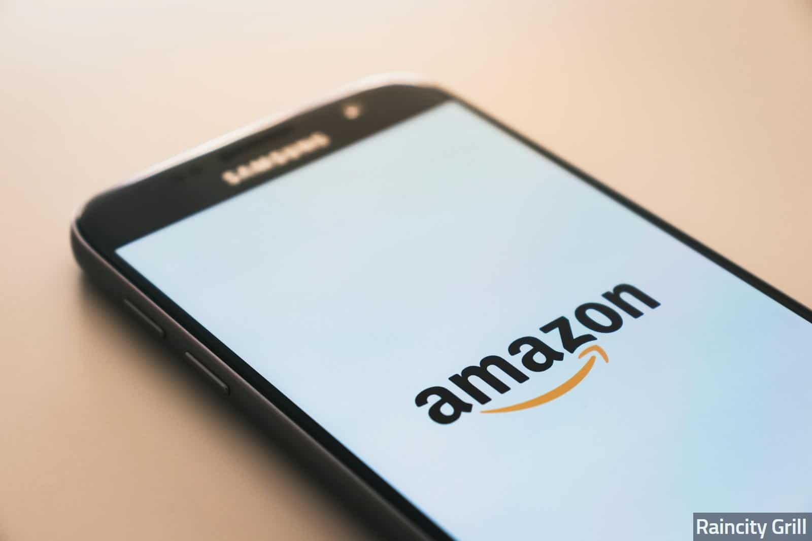 black Samsung Galaxy smartphone displaying Amazon logo
